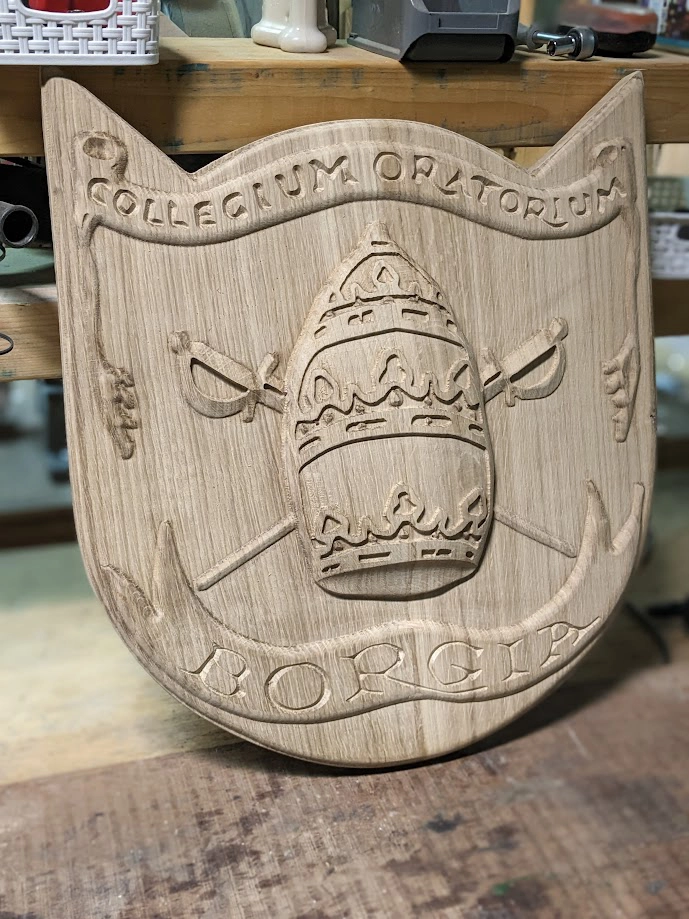 Wapenschild in hout gemaakt met CNC freesmachine